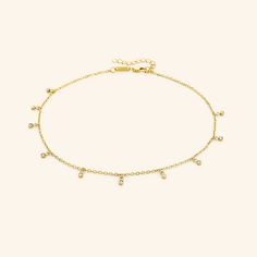 The beautiful bezels have made their return. Marked with a dangling array of gold encased gemstones, this choker provides a timeless and modernized wardrobe piece to elevate any outfit, dressed down or dressed up. Materials & Warranty Pendant Sizes: 3MM Chain: 0.5MM Cable Chain 13 inch chain + 3 inch extension (16 inches total) | Extensions are available here. Material: Real 18K Gold Plating on Pure Stainless Steel Hypoallergenic | Sensitive Skin-Friendly Waterproof | Keep it on in the shower Wa Gold Piece, Drawstring Pouch, Silver Pieces, Dainty Necklace, High Quality Jewelry, Real Gold, Cable Chain, Men Necklace, Gold Plating