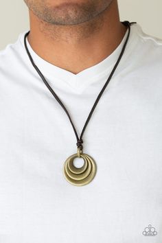 Textured and smooth beveled brass rings are knotted in place at the bottom of a brown leather cord, creating a rustic pendant. Features an adjustable sliding knot closure. Sold as one individual necklace. Adjustable Sliding Knot, Sliding Knot Closure, Loop Pendant, Mobile Boutique, Brass Rings, Sliding Knot, Paparazzi Accessories, Brass Necklace, Men's Necklace