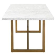 a white marble top table with gold metal frame legs and square base, against a white background