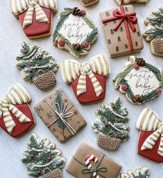 many decorated cookies are arranged on a table