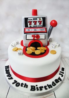 a birthday cake with a slot machine on top