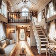 a living room filled with furniture and a staircase