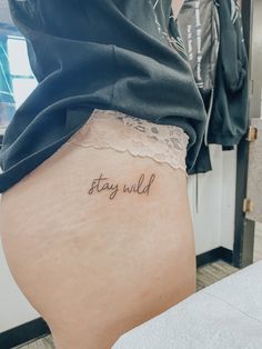 Stay Wild Hip Tattoo, Wild Love Tattoo, Wild As Her Tattoo, Keep Her Wild Tattoo, Stay Wild Buttcheek Tattoo, Stay Wild Tattoo Ideas, Rebellious Tattoos For Women, Wild Tattoo Word, Wild One Tattoo