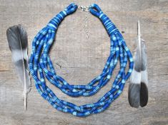 Only one blue fabric necklace for women has been totally woven in my little studio. Unique piece of jewelry in a style folk - bohemian - ethnic - tribal. This braided bib necklace is eco - friendly, soft and very light to wear. I mix different ends of yarn to create unique organic fiber jewelry. All woven cords are the effect of work of my hands. That's why each necklace in this series is one of a kind and unique. >>I hope that my jewelry introduced even a little magic and made you smile m Adjustable Handwoven Blue Necklace, Blue Fair Trade Beaded Necklaces For Festivals, Handmade Blue Bohemian Bib Necklaces, Handmade Gift For Mom, Fiber Jewelry, Fabric Necklace, Bib Necklaces, Boho Gifts, Support Handmade