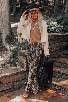 Hippie Style Fall Festival Pants, Hippie Fall Festival Pants, Trendy Floral Print Fall Bottoms, Chic Flared Bottoms With Floral Print, Chic Flared Floral Print Bottoms, Bohemian Flare Bottoms For Fall, Bohemian Style Flare Bottoms For Fall, Chic Floral Print Flare Bottoms, Chic Festival Bottoms For Fall