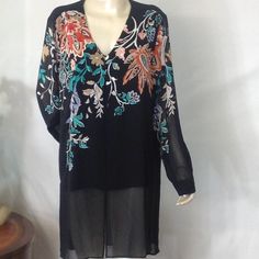 Size:3 Usa (L) Bohemian Bouquet Long Fashion Top Color: Black Pull Over Shirt Long Mesh Sleeves Lining On The Top Lon's Shirt 100% Polyester Buttons On Sleeves Cuff Embroidered Flowers On Front Neck Approximate Flat Laying Measure: Armpit To Armpit: 24" Top To Bottom: 32" Armpit To Hem Sleeves: 17" (13) Black Bohemian Blouse With Floral Print, Black Floral Print Festival Blouse, Black Floral Print Blouse For Festival, Elegant Floral Print Tunic Blouse, Elegant Floral Tunic Blouse, Bohemian Bouquet, Poncho Blouse, Blue Striped Top, Scoop Neck Blouses