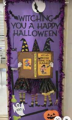 a purple door decorated with halloween decorations