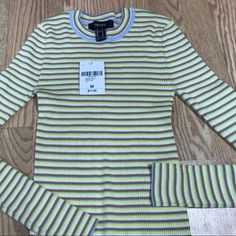 Forever 21 Long Sleeve Tee Size Medium Bust 22” Length 18” Measurements Are Approximate Forever 21 Striped Cotton Tops, Forever 21 Cotton Tops For Fall, Casual Striped Tops From Forever 21, Trendy Ribbed Tops From Forever 21, Forever 21 Fitted Crew Neck Top, Forever 21 Casual Long Sleeve Tops, Forever 21 Stretch Crew Neck Top, Striped Long Sleeve Tee, Knit Long Sleeve