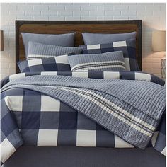 a blue and white checkered comforter set with the price $ 119 99 at poshmark