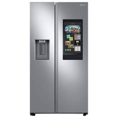 a silver refrigerator freezer sitting in front of a white wall