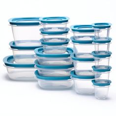 a stack of glass containers with blue lids