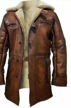 Mterial: 100% Real Leather. * Inner: Artificial fur * Color: Distressed Brown * Collar: Erect collar with Shearling * Pockets: Pockets on upper chest, two flap pockets at waist, and two inside pockets After the remarkable success of the blockbuster Hollywood movie, The Dark Knight Rises, where the noteworthy character of Bane was outstandingly performed by Tom Hardy as a villain and wearing such astonishing Bane leather coat on his physique, is now a part of The Leather City at an amazing price. Bane Jacket, Trench Outfit, Shearling Leather Jacket, Lambskin Coat, Brown Leather Coat, Dark Knight Rises, Leather Coat Jacket, The Dark Knight Rises, The Dark Knight