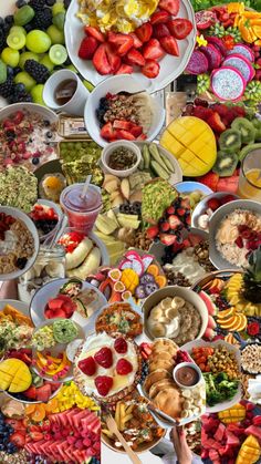 a large assortment of fruits and vegetables arranged in the shape of a pyramid