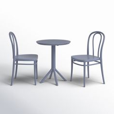 two chairs and a table are shown in this 3d image, the chair is blue