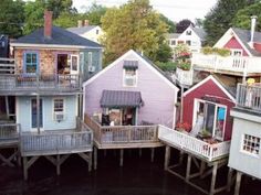 a group of houses sitting on top of each other