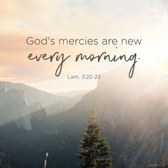 a mountain with the words god's mercies are new every morning on it