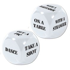 two white dices with words on them that say, take a shot and not a table