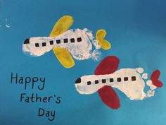 a child's handmade fathers day card with an airplane and plane