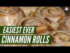 some cinnamon rolls sitting in a pan with icing on them and the words, easyest ever cinnamon rolls