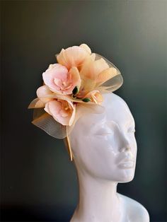 elegant magnolia or orchid flower fascinator headpiece, perfect for tea parties, derby events, and other special occasions!  Thank you for supporting small businesses and we hope our products bring you and your loved ones Joy & Happiness! S H I P P I N G  -   Last minute masquerade mask shopping? 24 hr processing available. Pick appropriate shipping method and leave us checkout note! 1-2 day guaranteed delivery services also offered, add items to cart and click on shipping tab for rates.  Pls leave a check out note with your need date & contact number (especially for expedited and custom orders) Msg for delivery time frames (Include your state/country). S I Z E Adult size. Detailed dimensions are available upon request. C O N T A C T Text: 1-516-654-4643 Email: Lanai.ink6 [!at] gmail.com W Chic Kentucky Derby Headband Fascinator, Chic Adjustable Fascinator For Garden Party, Chic Spring Party Headband, Structured Crown Fascinator For Garden Party, Feminine Fascinator For Kentucky Derby And Garden Party, Feminine Fascinator For Garden Party And Kentucky Derby, Elegant Spring Fascinator With Matching Headband, Elegant Headpiece With Pinched Crown For Garden Party, Elegant Summer Fascinator With Matching Headband