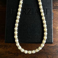 Step into a new era of sophistication with our highly anticipated 5mm Pearl Rondelle Necklace showcasing a full string of genuine ivory pearls with gold detailing. Wear this men’s pearl chain with a matching pearl bracelet for a style that’s hitting top of the charts currently with celebrities and professional athletes. Our Men's Pearls Collection, features sophisticated fresh water pearl necklaces and bracelets, designed especially for men. Drawing inspiration from historical royalty who layere Elegant Single Strand Cream Pearl Necklace, Elegant Cream Necklace With Pearl Charm, Elegant Cream Necklaces With Pearl Charm, Elegant Cream Single Strand Pearl Necklace, Cream Pearl Chain Jewelry, Elegant Cream Single Strand Necklace, Classic Cream Pearl Chain Necklace, Classic Cream Necklace With Pearl Chain, Classic Cream Pearl Necklace With Pearl Charm