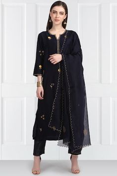 Black kurta with floral motif sequin and resham work. Comes with straight pants and embellished border dupatta.
Components:3
Embroidered
Neckline:Round
Sleeve Length:Three quarter
Fabric:Silk Chanderi, Organza
Color:Black
Cuff sleeves
Split neckline
Side slits
Semi elasticated waistband pants
Pants: Tie-up chord
 - Aza Fashions Label Earthen, Navy Blue Fabric, Embroidered Neckline, Indian Fashion Designers, Kurta With Pants, Silk Shorts, Kurta Set, Raw Silk, Straight Pants