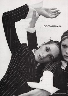 two young women are posing for a black and white photo