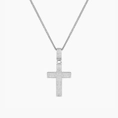 Product Details Chain Type: Mini Cuban Chain Chain Length: 16" + 2" Inch Extension Closure: Lobster Clasp Stone: Cubic Zirconia Metal Selection: Sterling Silver 14k Gold over Silver Description Celebrate your faith with the Zirconia Enriched Cross Pendant Necklace in a high-polish finish. Features a moving cross charm decked with mini cubic zirconia gems and a matching gem-adorned pendant bail. Available in premium sterling silver and 14K gold plating, the piece measures 16’’ and comes with a cl Pendant Bail, Pendant Bails, Gold Cross Pendant, Photo Pendant, Personalized Rings, Engraved Jewelry, Cuban Chain, Cross Charms, Cross Pendant Necklace