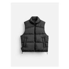 Puffer vest made of technical fabric. Sleeveless design with high collar. Welt pockets at hip and interior pocket. Adjustable hem with side elastic. Front zip closure.