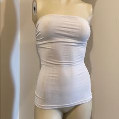 Super Fun Strapless Top Light Weight Size S/P Lightly Ruched On Sides To Give It A Sexy Look Color Light Gray Fast Shipping Bundle And Save Happy Poshing White Bandeau Tank Top, Stretch Strapless Tank Top With Built-in Bra, White Fitted Tube Top With Built-in Bra, White Seamless Strapless Tank Top, Strapless Fitted Seamless Tank Top, Seamless Fitted Strapless Tank Top, Fitted Seamless Strapless Tank Top, White Seamless Bandeau Tank Top, Fitted White Tube Top With Built-in Bra