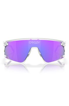 a pair of sunglasses with purple mirrored lenses on the top and bottom, in front of a