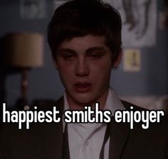 a man in a suit with the words happiest smiths enjoyer