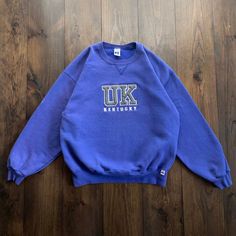 Vintage 1990s University of Kentucky Russell Athletic Embroidered Crewneck Sweatshirt / size XL Pit to Pit:   23" Top of Shoulder to Bottom Hem:   27" Collar to Bottom of Sleeve:   31" Please check the measurements before purchasing  ---------------------------------- 🛒 Why Vintage? Vintage clothing is an environmentally sustainable way to shop for cool, unique, and rare clothing. Vintage clothing is typically higher quality than modern fast fashion manufacturing. Material from the 80s, 90s and Vintage Embroidered Sweatshirt For Streetwear, 90s Embroidered Sweatshirt For Fall, 90s Embroidered Fall Sweatshirt, Vintage Embroidered Crew Neck Sweatshirt, Vintage Embroidered Oversized Tops, Vintage Embroidered Sweatshirt, Fashion Manufacturing, Rare Clothing, Embroidered Crewneck