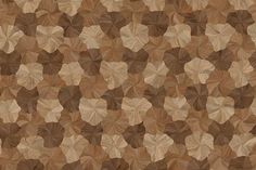 an abstract pattern made up of brown leaves