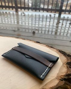 Small fold over wallet with strap. Made with durable, flexible black leather. Wallet With Strap, Money Clip Wallet, Parma, Fold Over, Purse Wallet, Wallets, Black Leather, Wallet, Purses And Bags