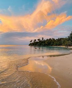 the beach is clean and empty at sunset