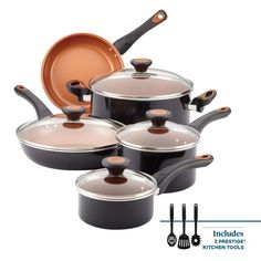 an assortment of pots and pans with lids