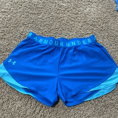 Never Worn, New With Tags Blue Under Armour Bottoms With Built-in Shorts, Blue Under Armour Summer Shorts, Under Armour Blue Shorts For Summer, Under Armour Summer Blue Bottoms, Under Armour Blue Bottoms For Summer, Blue Under Armour Sports Shorts, Under Armour Blue Sports Shorts, Sporty Blue Athletic Shorts By Under Armour, Sporty Blue Under Armour Athletic Shorts