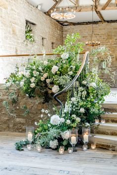 #hootonpagnell #hootonpagnellhall #whitewedding #weddingflowers #weddingflorals #weddingplanner #weddingday #weddingstylist #weddingdecor #weddingdecoration #bridetobe #rusticwedding #wedding #styledshoot #weddingmockup #tablecentre #tablescape #acrylicplinth #whiteflowers #underthefloralspell #weddingplanner #weddingcoordinator #weddingmanagement #louis #weddingfurniture #glassware #placesetting #crockery #cutlery #napkin #weddingstationery #candle #candlelight #urn #stoneurn #floralurn Staircase Floral Installation, Staircase Installation, Wedding Installations, Wedding Stairs, Wedding Staircase, Rustic Modern Wedding, Wedding Reception Flowers, Elegant Wedding Reception, Staircase Decor