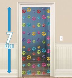 the door is decorated with colorful stars and balloons for a birthday party or other celebration