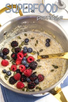 the bowl is full of oatmeal and berries