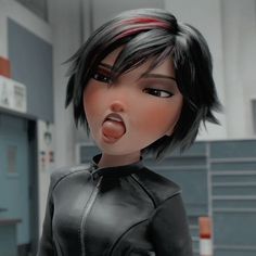 a close up of a doll wearing a black jacket and tongue sticking out to the side