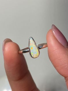 Gorgeous Australian white opal I cut and set in my handcrafted sterling silver setting. US size 7! Outdoor pictures are during late sunset, outdoors it is absolutely gorgeous! White Opal Ring, Outdoor Pictures, White Opal, Stackable Rings, Opal Rings, Opal, Jewelry Rings, White, Sterling Silver