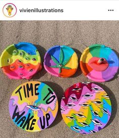 four colorful paper plates that say time to wake up