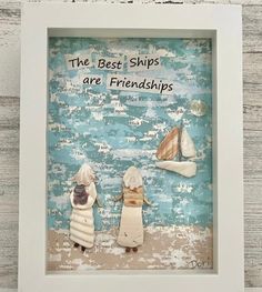 two sea shells in a white frame with the words, the best ships are friends