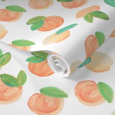 an orange and green watercolor pattern on white paper with leaves, flowers and circles