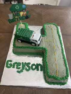 a birthday cake that is shaped like a truck