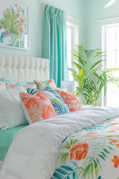 a bedroom with blue walls and white bedding, green curtains, and colorful pillows