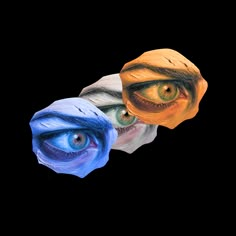 two different colored objects with one eye looking at the other