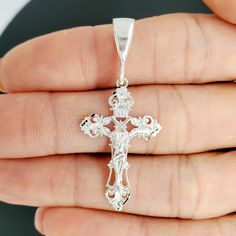 925 Sterling Silver Diamond cut INRI Crucifix charm, in Large and small. Fancy silver sparkle Crucifix pendant, religious pendant for men and women, a gift for him or her and stamped 925 for authenticity. Crucifix Length with bale: ~6.9cm and ~4.9cm We proudly stand behind the quality of our products and prioritize your satisfaction above all else. If, for any reason, you are not completely satisfied with your purchase, we offer hassle-free returns with full refunds of the purchase price. Your h Silver Diamond Crucifix Jewelry, Elegant Sterling Silver Crucifix Jewelry And Charms, Sterling Silver Crucifix Necklace With Diamond Accents, Silver Crucifix Jewelry Collectible, Nickel-free Sterling Silver Crucifix Necklace, Mens Pendant, Silver Diamonds, Chains Necklace, Sterling Silver Jewelry